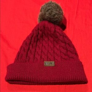 Stylish Red Cable Knit Beanie with Pom-Pom